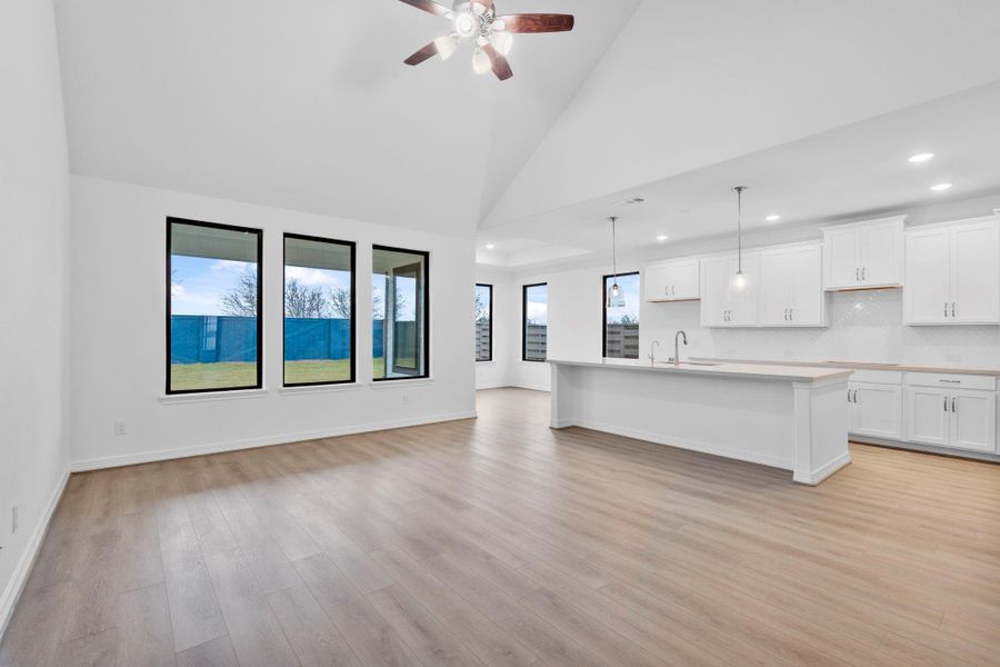 Natural light floods the space the moment you step in from the foyer into the main living space.