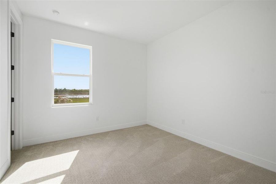Spacious, unfurnished interior of a new home in Fieldstone, Plant City (Image 56).