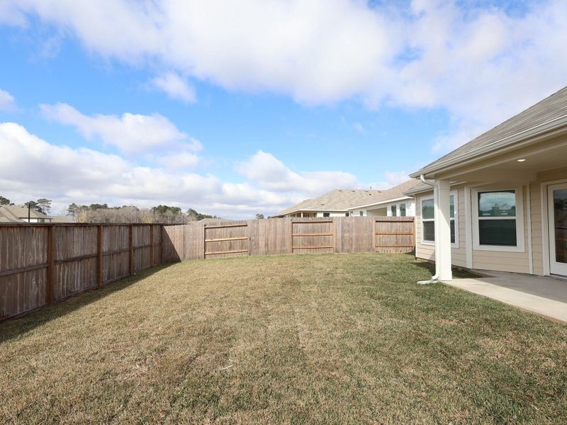 Exterior details and patio area of a home in Moran Ranch, Willis (Image 17).