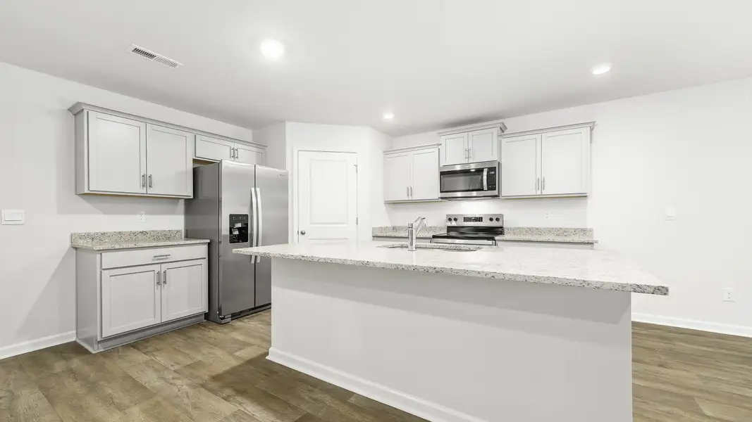 Furnished interior view inside a new home in Greystone North, Stoneville (Image 3).