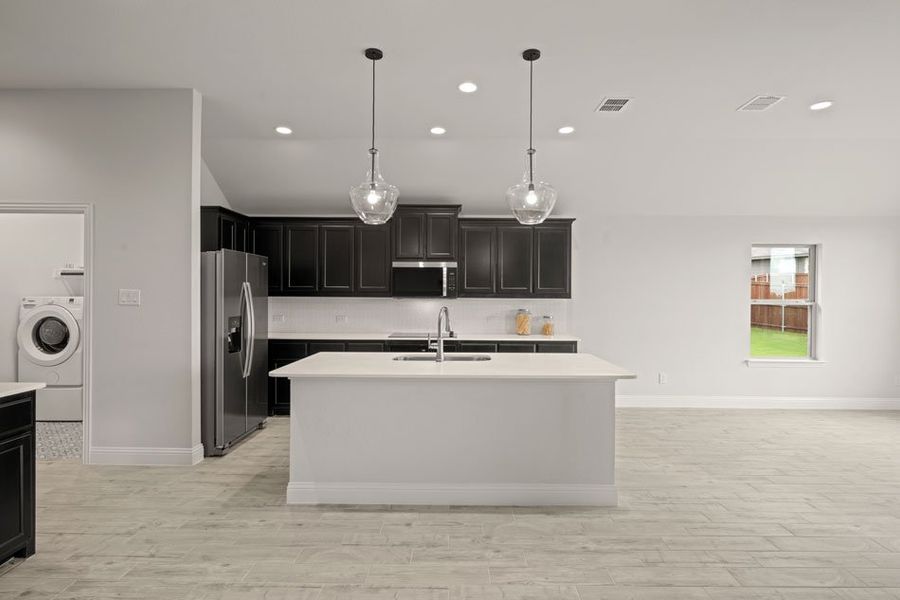 Representative exterior photo of a completed home built from the Balmoral by Impression Homes in Timberbrook, Justin, TX (Image 3).