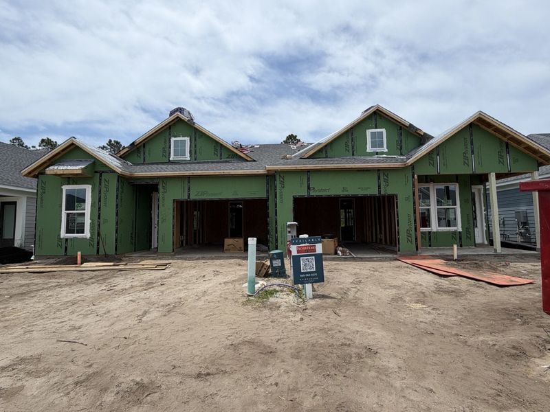 In-progress construction of a new home in The Villas at Longleaf Park, a Watersound Origins® community, Inlet Beach, FL (Image 7).
