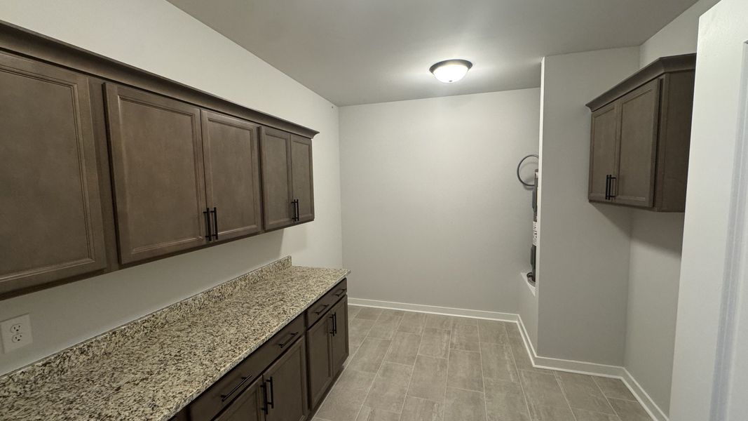 Furnished interior view inside a new home in The Greens at Legacy Townhomes, Springfield (Image 9).