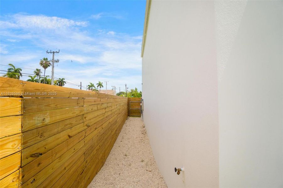 Exterior details and patio area of a home in , Miami (Image 3). Exterior details and patio area of a home in , Miami (Image 3).
