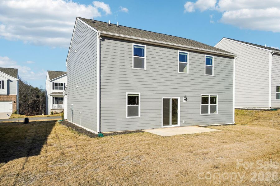 Exterior details and patio area of a home in Rydele Heights, Asheville (Image 3).