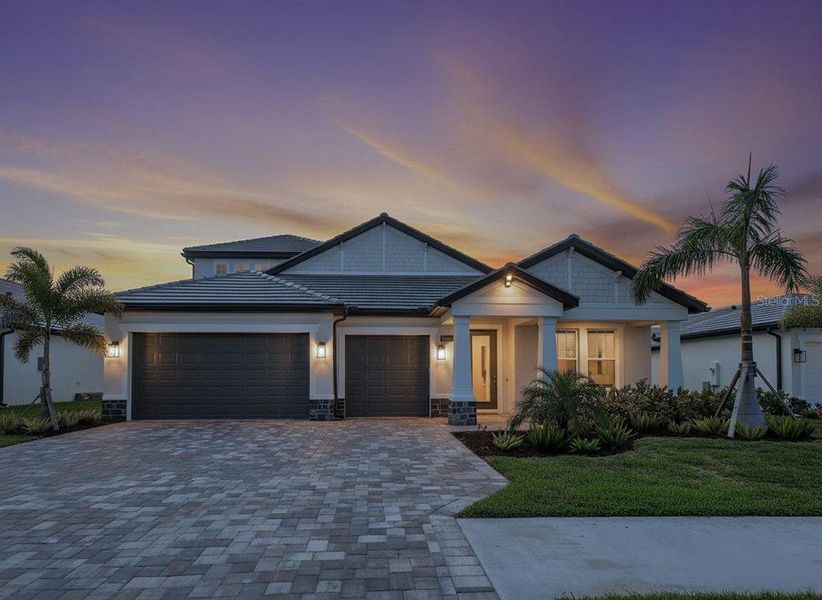 Front exterior of a new home in , Nokomis, FL, highlighting curb appeal (Image 28). Front exterior of a new home in , Nokomis, FL, highlighting curb appeal (Image 28).