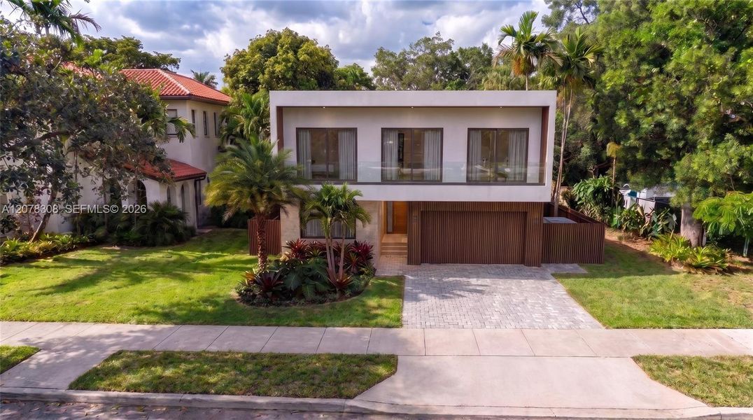 Front exterior of a new home in , El Portal, FL, highlighting curb appeal (Image 17). Front exterior of a new home in , El Portal, FL, highlighting curb appeal (Image 17).