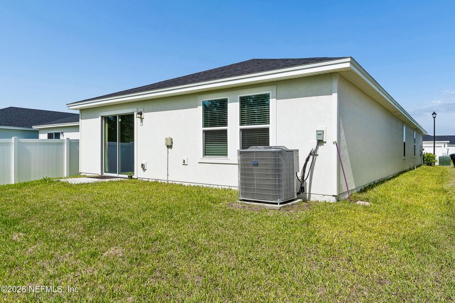 Exterior details and patio area of a home in Lakes at Bella Lago – Classic Series, Green Cove Springs (Image 22).