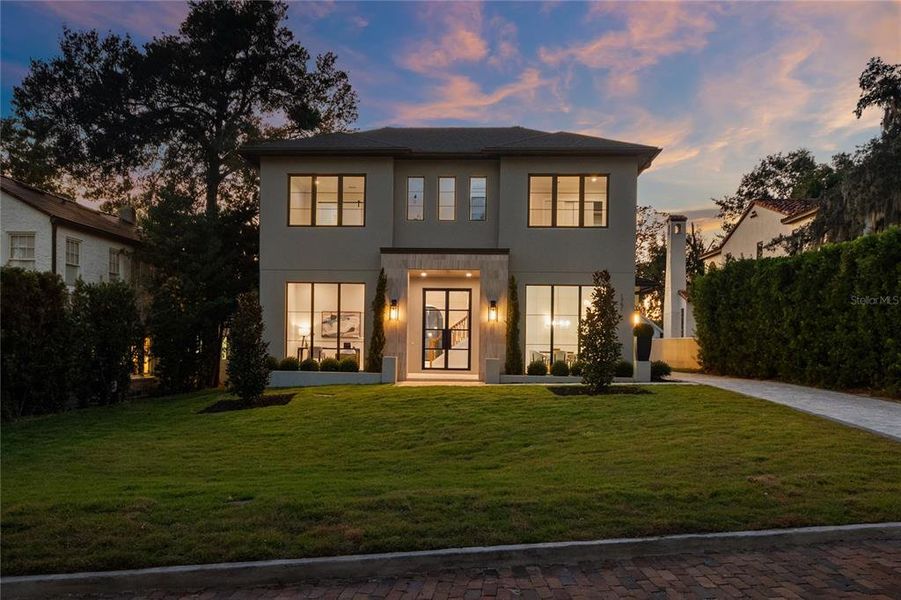 Front exterior of a new home in , Winter Park, FL, highlighting curb appeal (Image 1).