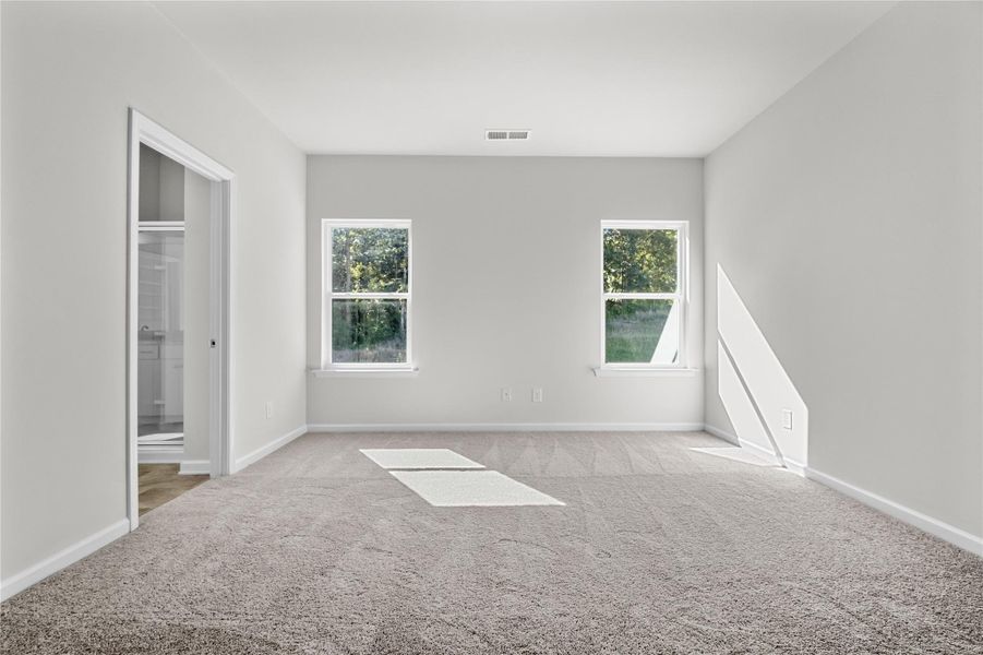 The Coleman- Primary Suite. Home under construction, photo used for illustrative purposes only, colors and options will vary. The Coleman- Primary Suite. Home under construction, photo used for illustrative purposes only, colors and options will vary.