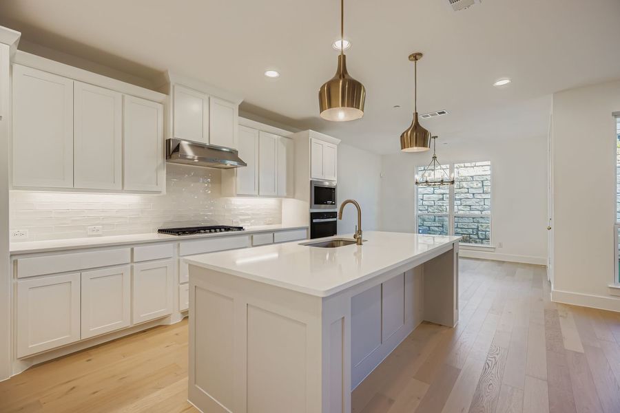 Furnished interior view inside a new home in Castle Hills Northpointe - Townhomes, Carrollton (Image 7). Furnished interior view inside a new home in Castle Hills Northpointe - Townhomes, Carrollton (Image 7).