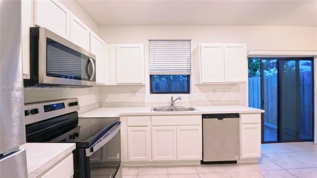 Furnished interior view inside a new home in , Florida City (Image 13).
