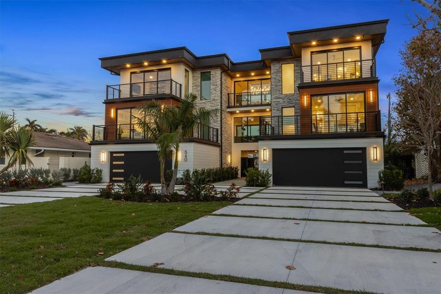 Front exterior of a new home in , Sarasota, FL, highlighting curb appeal (Image 22).