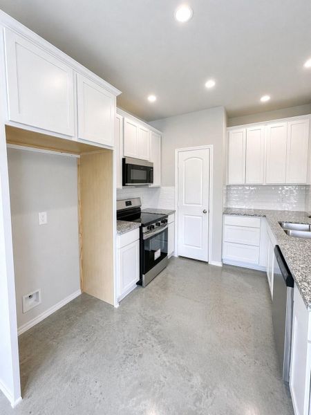 Furnished interior view inside a new home in , Trinity (Image 6).