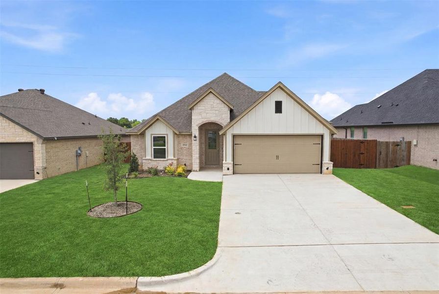 Front exterior of a new home in , Tolar, TX, highlighting curb appeal (Image 2). Front exterior of a new home in , Tolar, TX, highlighting curb appeal (Image 2).