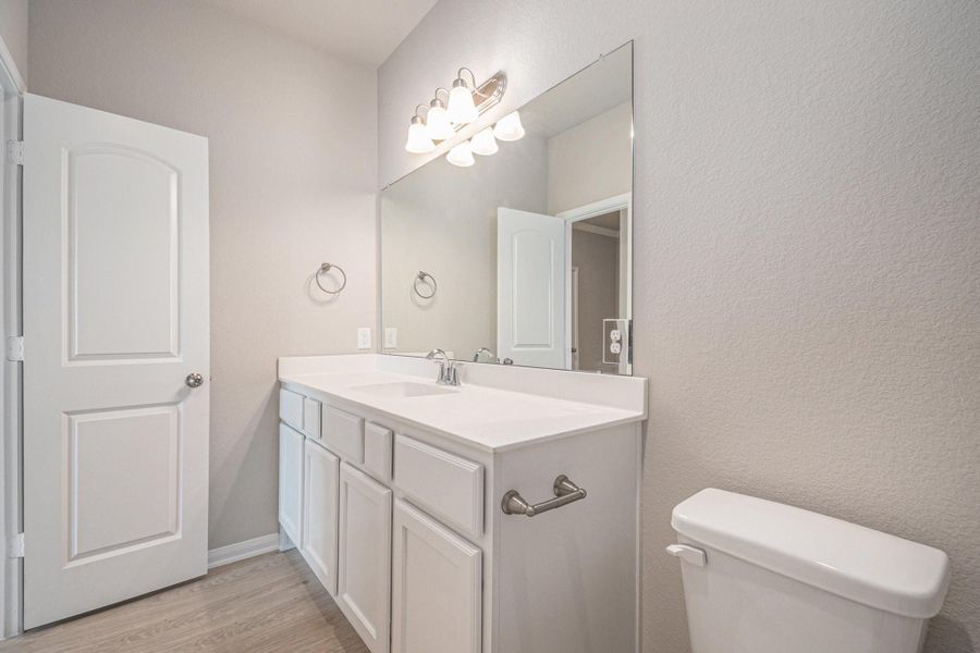 Furnished interior view inside a new home in Clear View Estates, Willis (Image 8).