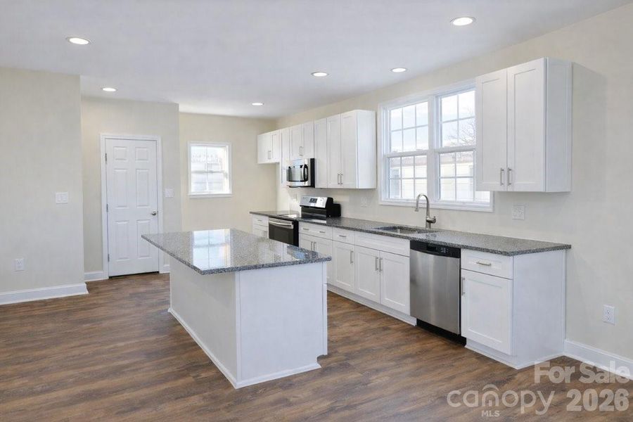 Furnished interior view inside a new home in , Monroe (Image 9).