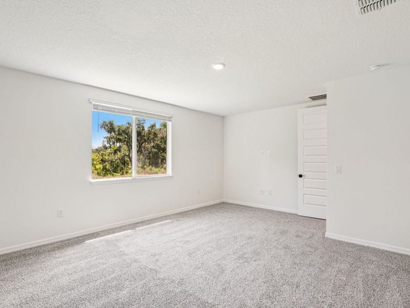 Spacious, unfurnished interior of a new home in Oakfield Trails - Signature Series, Parrish (Image 10).