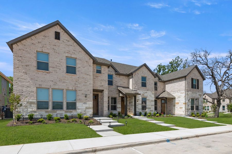 Front exterior of a new home in Timber Ridge, Corinth, TX, highlighting curb appeal (Image 2). Front exterior of a new home in Timber Ridge, Corinth, TX, highlighting curb appeal (Image 2).