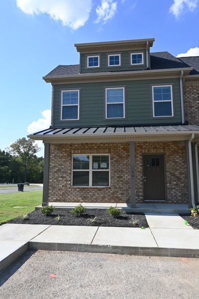Front exterior of a new home in Talia Trace, Smyrna, TN, highlighting curb appeal (Image 2). Front exterior of a new home in Talia Trace, Smyrna, TN, highlighting curb appeal (Image 2).