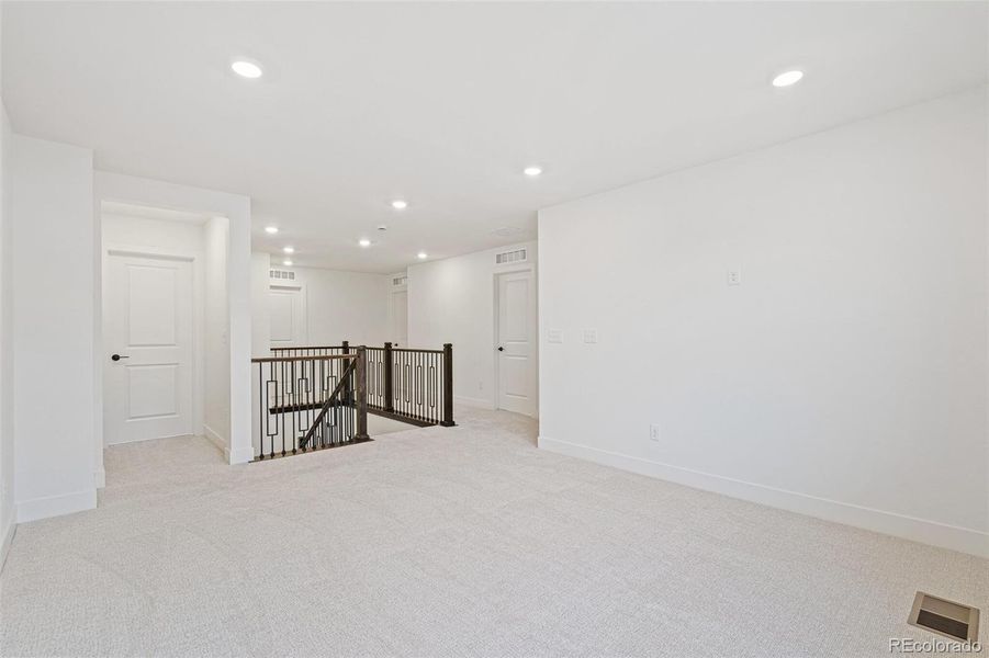 Spacious, unfurnished interior of a new home in Windsong, Thornton (Image 24).