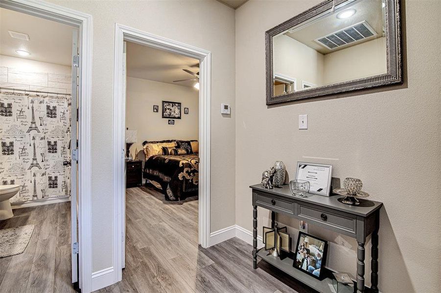 Hallway featuring hardwood / wood-style flooring