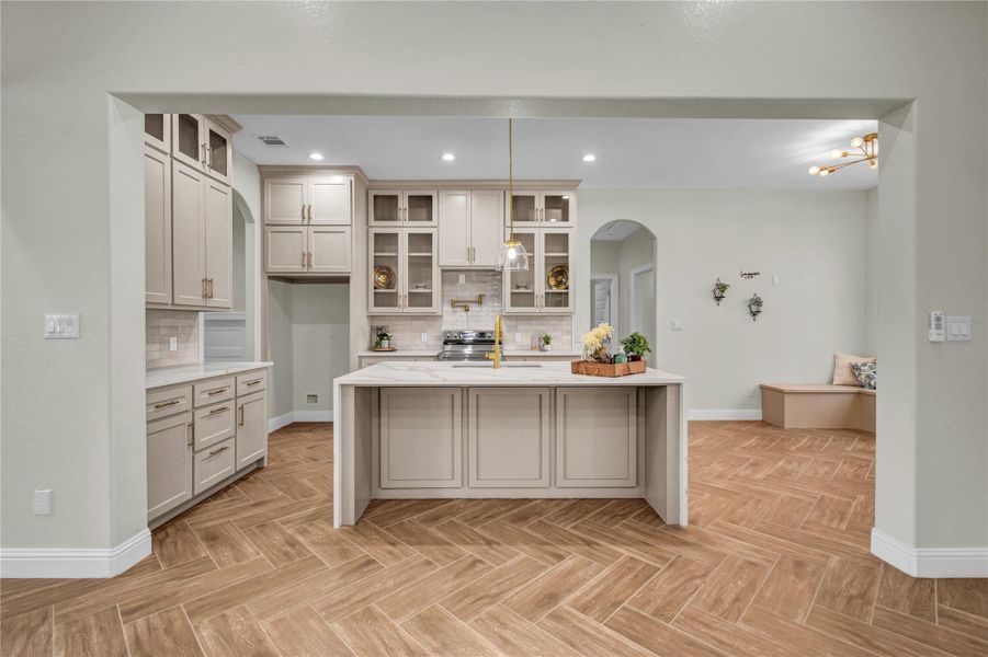 Kitchen fron view, glass cabinets, pot filler Kitchen fron view, glass cabinets, pot filler