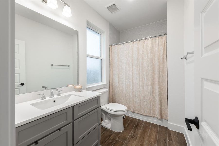 Soft-close doors and drawers continue in all of the bathrooms.  Another nice neutral space- all your furnishings will fit in fine!