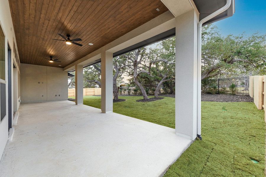 View of patio featuring ceiling fan and fence View of patio featuring ceiling fan and fence