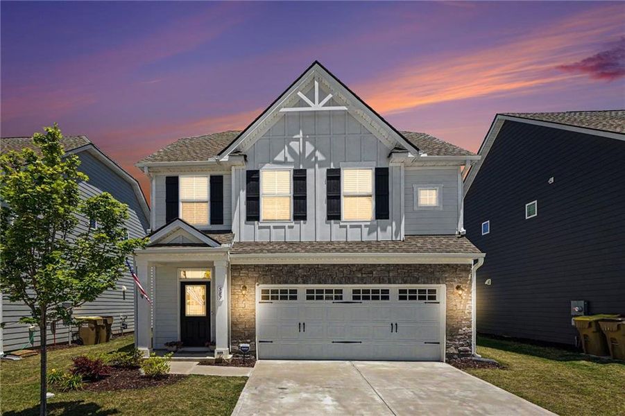 Front exterior of a new home in , Hoschton, GA, highlighting curb appeal (Image 2). Front exterior of a new home in , Hoschton, GA, highlighting curb appeal (Image 2).