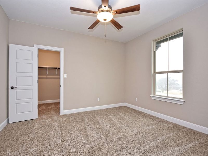 Representative unfurnished interior of a home built from the Madera II by Giddens Homes in Scofield Farms Estates, Georgetown (Image 344).