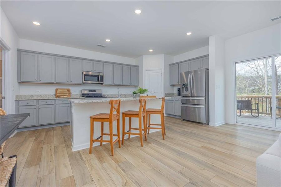 Furnished interior view inside a new home in Creekside at Farmers Crossing, Ball Ground (Image 38).