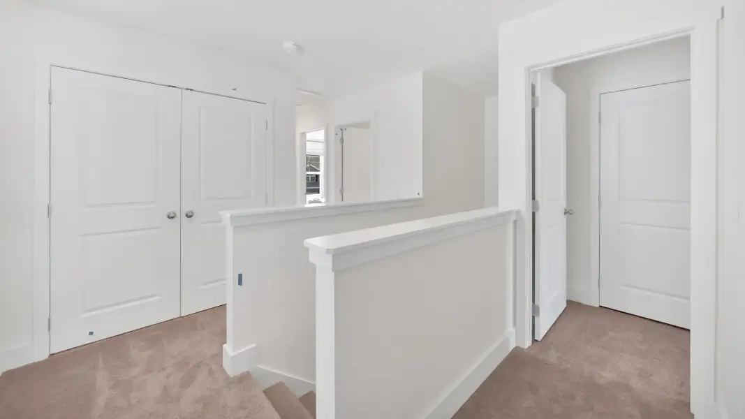 Representative unfurnished interior of a home built from the Mitchell Townhome by D.R. Horton in Oak Vista, Knoxville (Image 18).