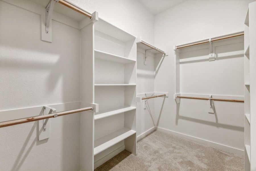 Primary Closet in the Cedar home plan by Trophy Signature Homes – REPRESENTATIVE PHOTO Primary Closet in the Cedar home plan by Trophy Signature Homes – REPRESENTATIVE PHOTO