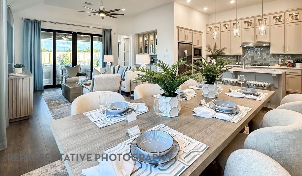 Dining area featuring wood finished floors, recessed lighting, and a ceiling fan Dining area featuring wood finished floors, recessed lighting, and a ceiling fan