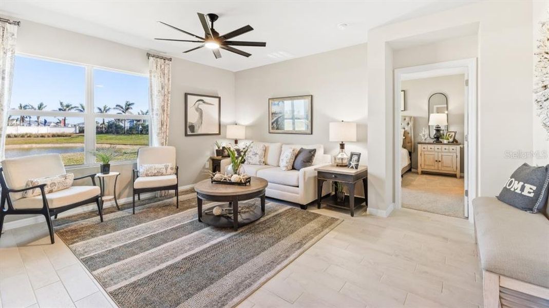 Furnished interior view inside a new home in Central Parc, North Port (Image 11).