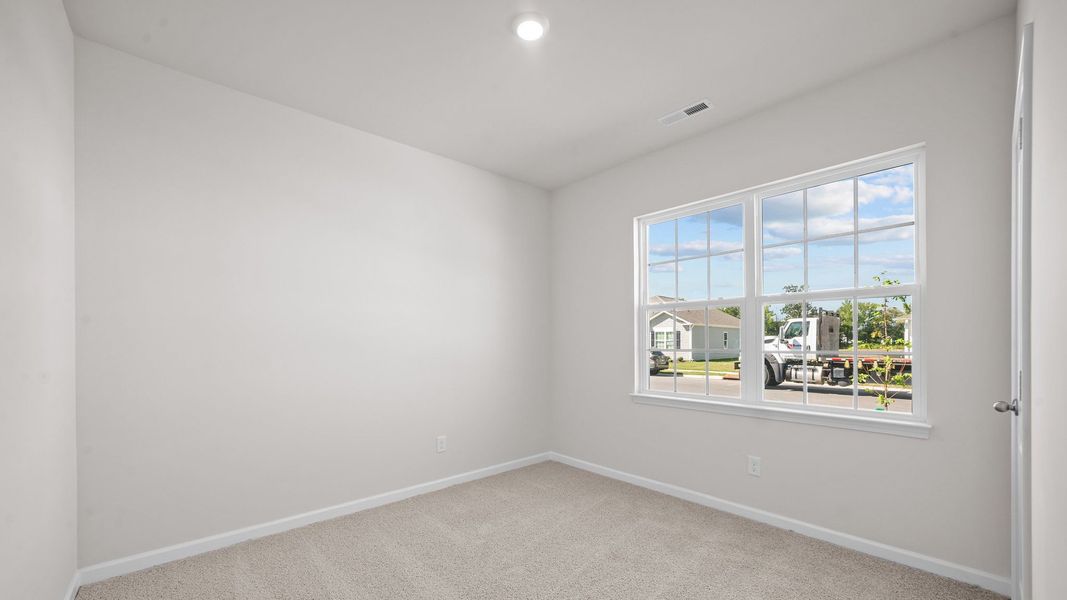 Spacious, unfurnished interior of a new home in Ridgewood Farms, Winterville (Image 16).