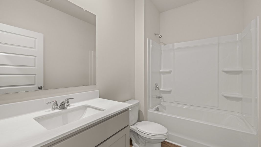 Furnished interior view inside a new home in Champion's Run, Lithonia (Image 13).