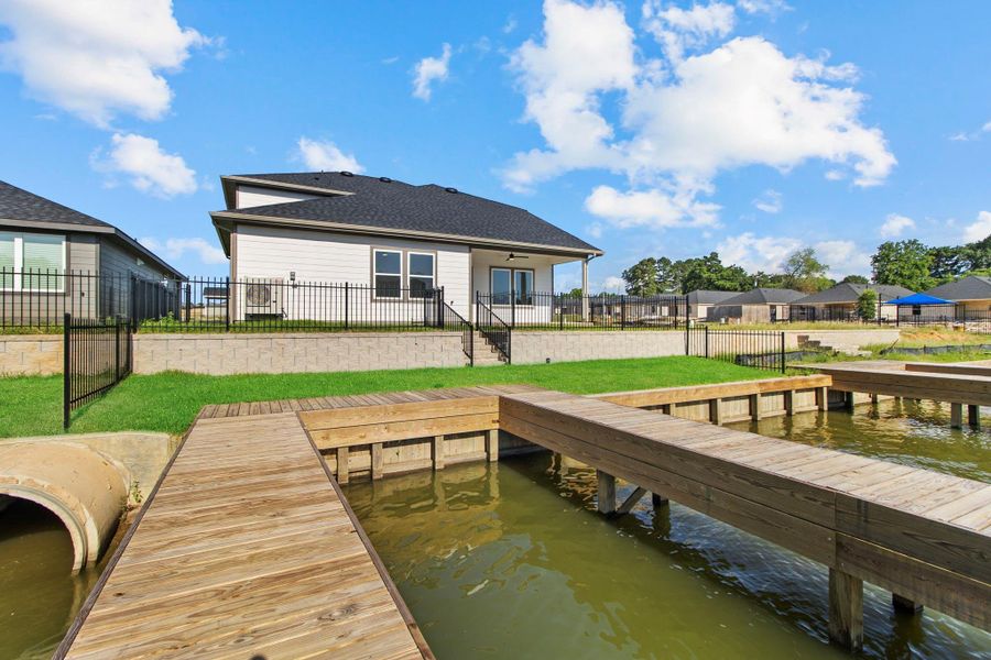 Exterior details and patio area of a home in Lake Conroe Cove, Willis (Image 18). Exterior details and patio area of a home in Lake Conroe Cove, Willis (Image 18).