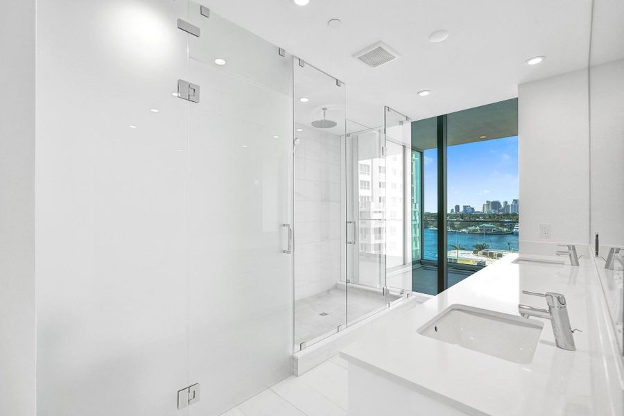 Primary bath features huge shower and dual sinks. Primary bath features huge shower and dual sinks.