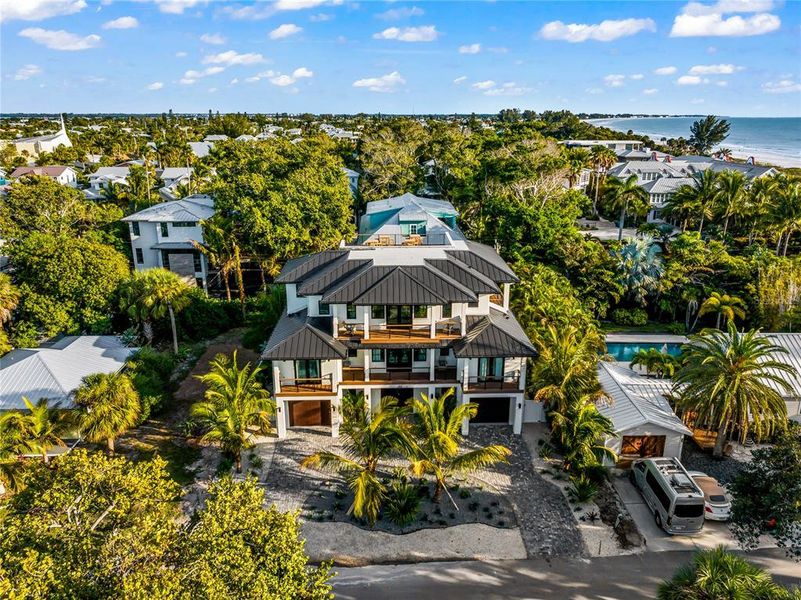 Front exterior of a new home in , Anna Maria, FL, highlighting curb appeal (Image 20).