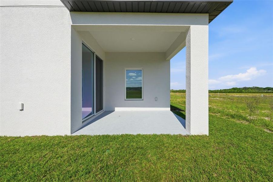 Exterior details and patio area of a home in Gum Lake Preserve, Lake Alfred (Image 31).
