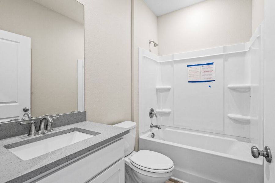 Furnished interior view inside a new home in Natureview, Freeport (Image 10).