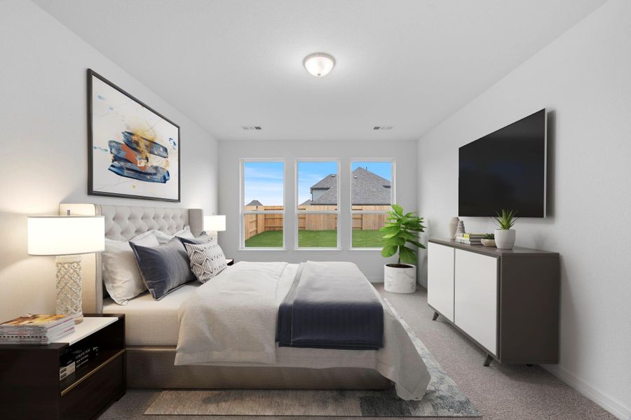 The primary bedroom is generously sized, creating a tranquil and spacious retreat that offers ample room for relaxation. Featuring plush carpet, high ceilings, fresh paint, and large windows that lets in natural lighting throughout the day.