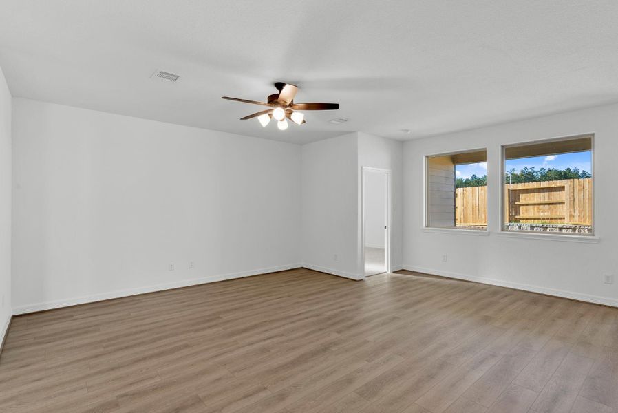 Large windows in living room to view back yard