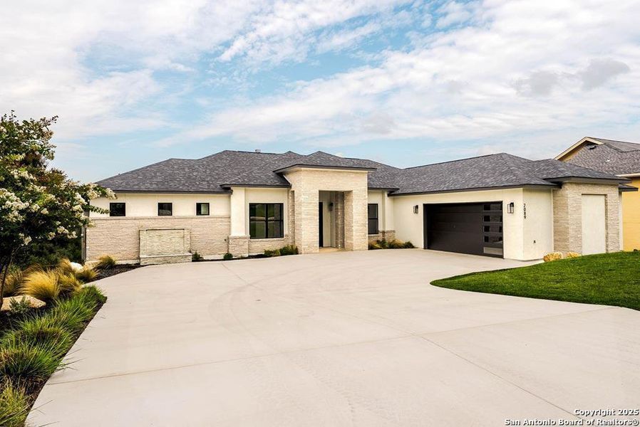 Front exterior of a new home in , Kerrville, TX, highlighting curb appeal (Image 23). Front exterior of a new home in , Kerrville, TX, highlighting curb appeal (Image 23).