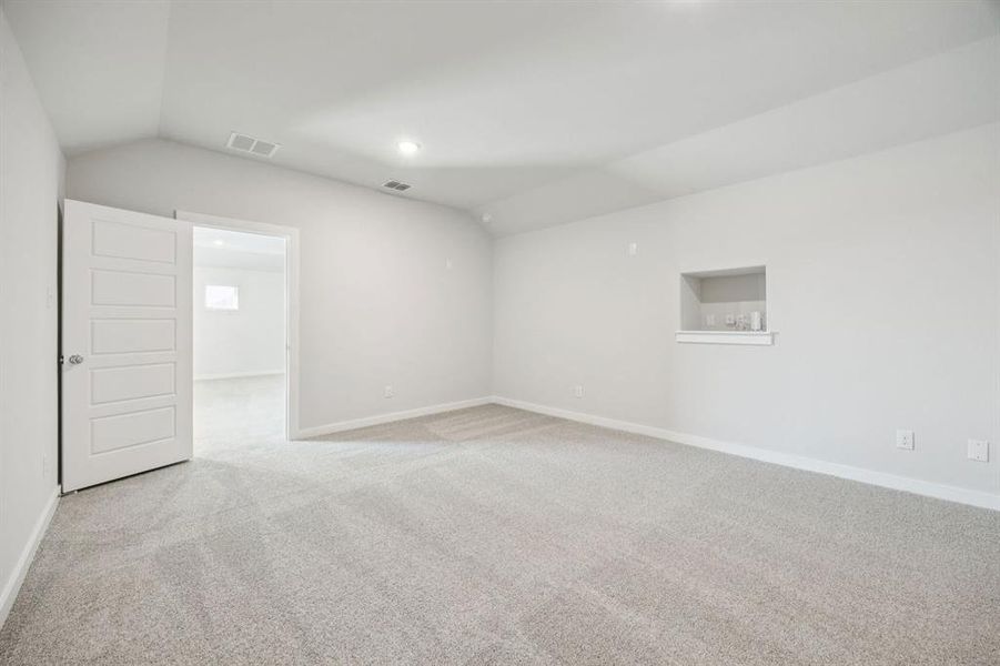 Media room in the Masters home plan by Trophy Signature Homes – REPRESENTATIVE PHOTO