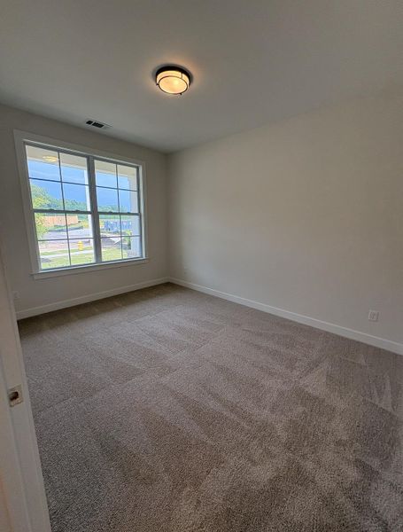 Spacious, unfurnished interior of a new home in Villages of Green Meadows, Munford (Image 15).