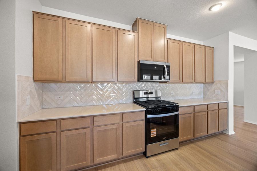 Furnished interior view inside a new home in Salerno - Classic Collection, Round Rock (Image 11).