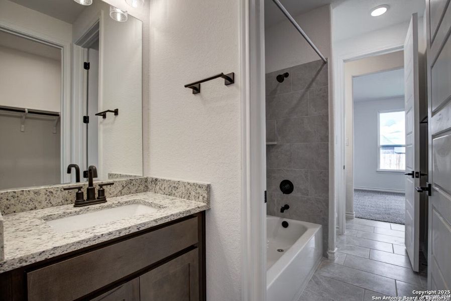 Furnished interior view inside a new home in The Reserve at Potranco Oaks, Castroville (Image 26).